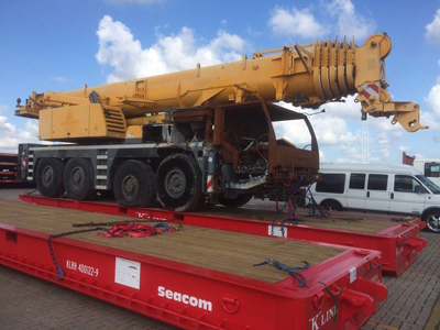 Export Logistics & Shipping, Inc. places Liebherr LTM1100 crane on platform